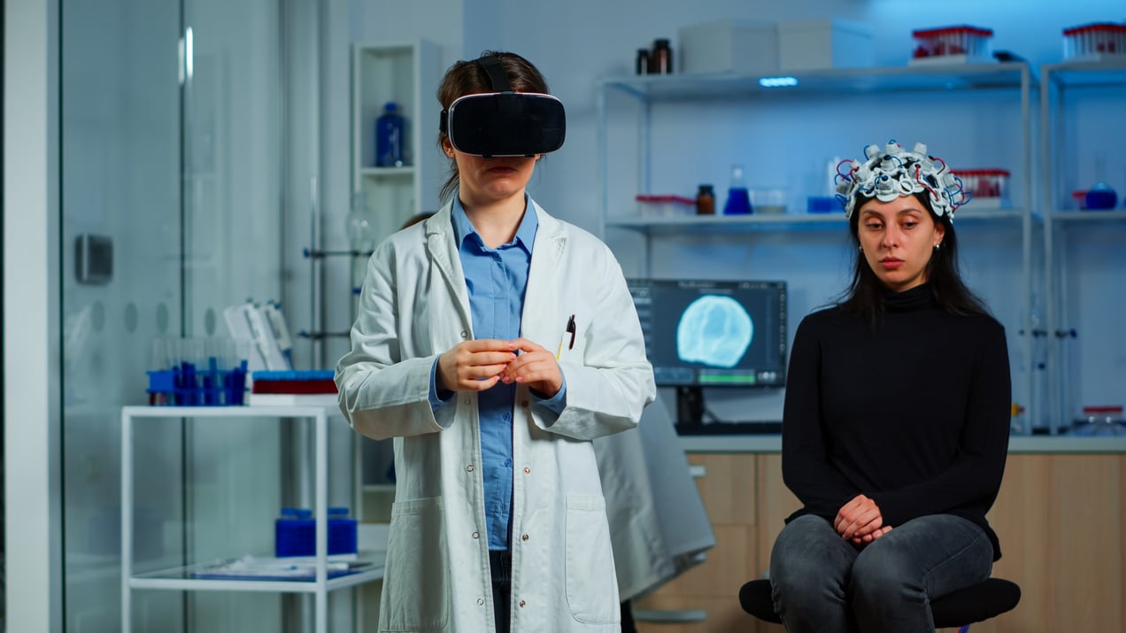 laboratory-doctor-experiencing-virtual-reality-using-vr-goggles-medical-neurological-research-lab